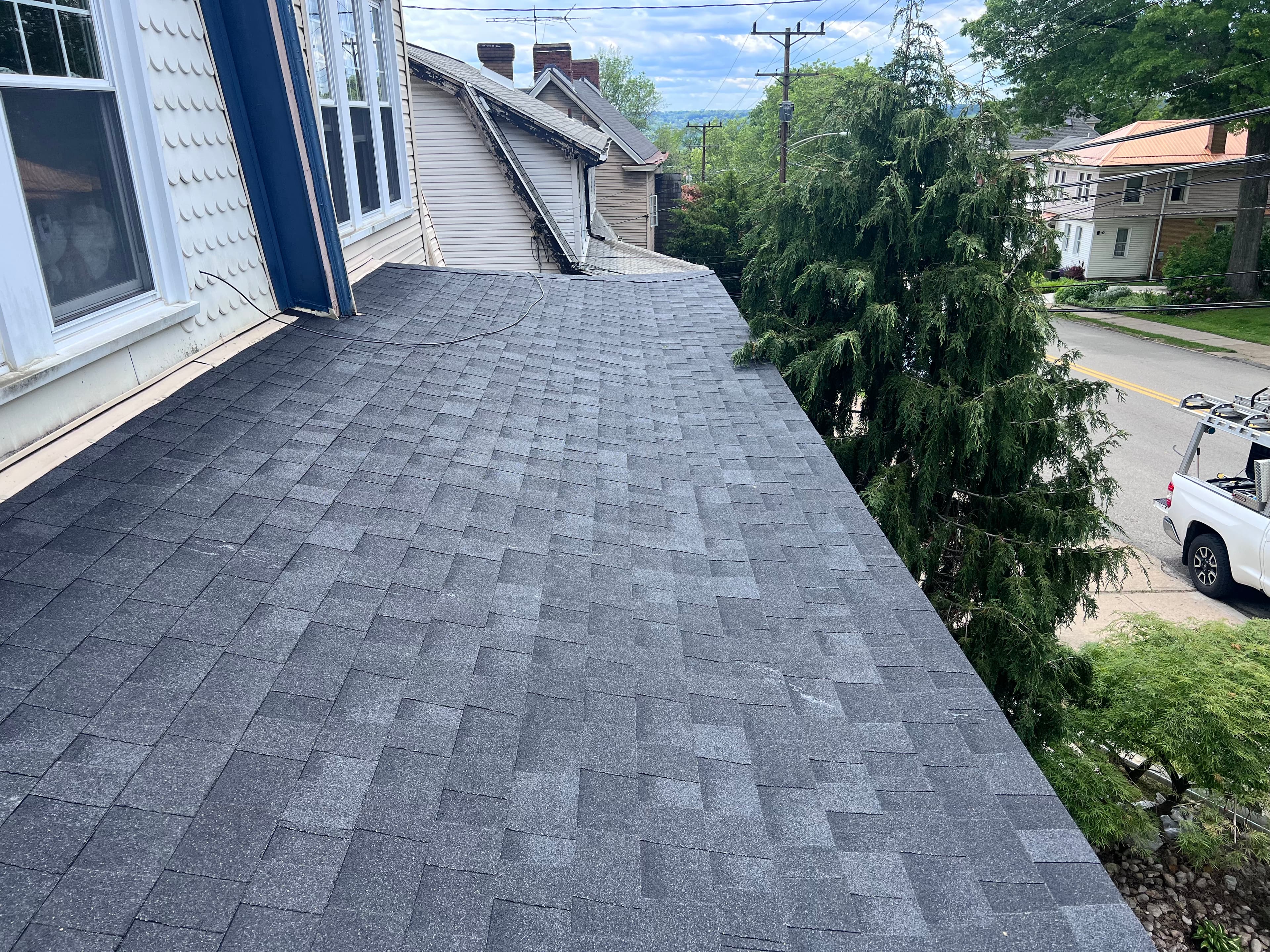 Finished porch roof and box gutter bridging